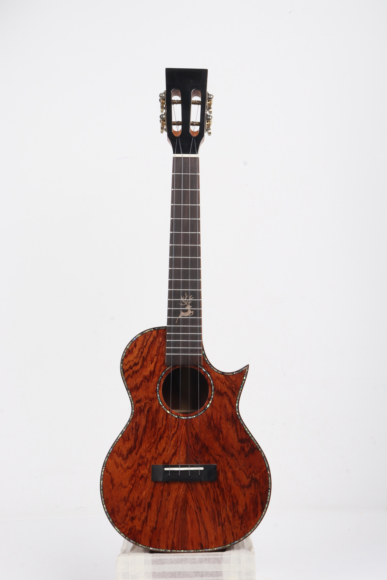 Padauk wood ukulele cutaway