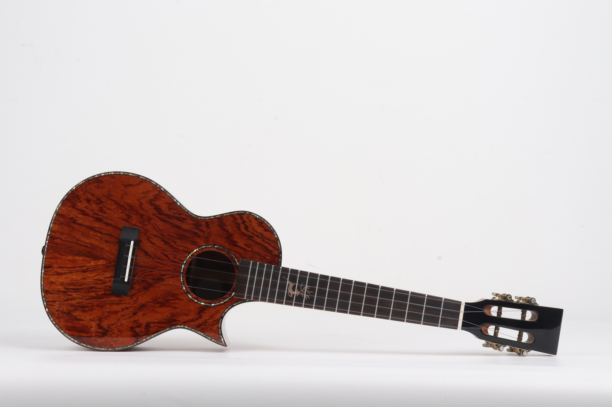 Padauk wood ukulele cutaway